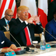 President Donald Trump gestures next to Tunisia’s President Beji Caid Essebsi, left, and Niger’s President Mahamadou Issoufou, right, at a G7 Summit expanded session in Taormina, Italy on May 27, 2017 (Jonathan Ernst/Pool Photo via AP)